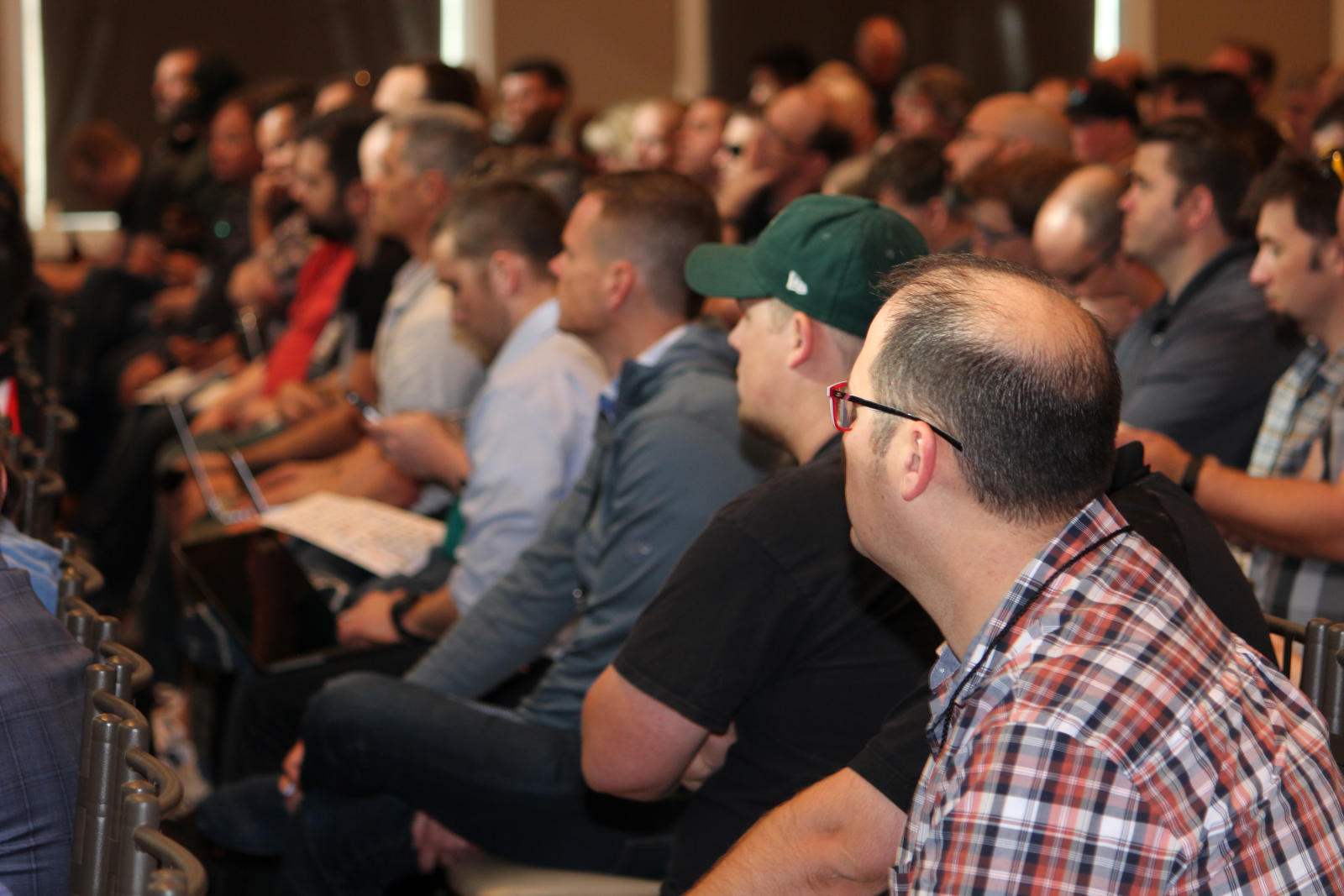 Engaged attendees in the audience at Salt Lake City DevOps Days